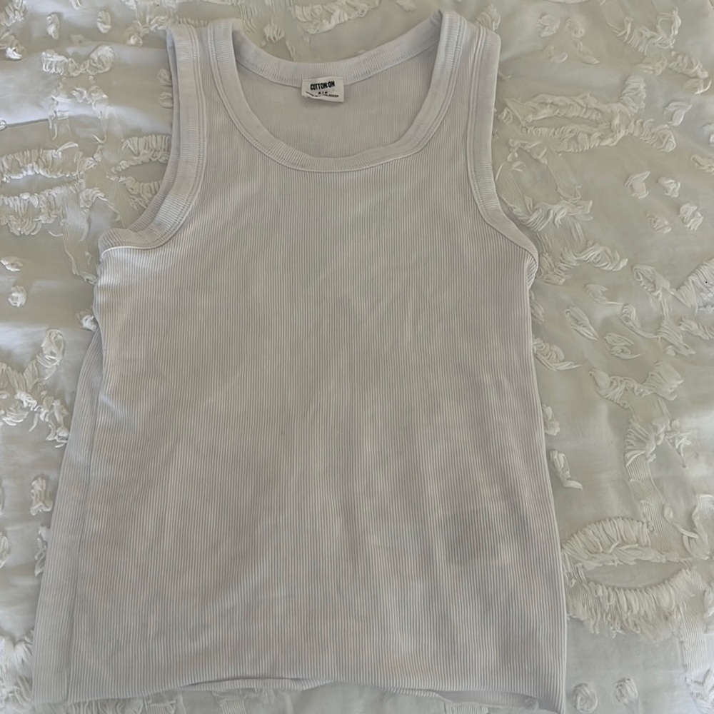 Cotton on white tank